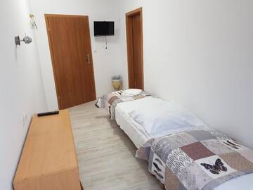 Фото номера Четырехместный номер с балконом Гостевой дом Gościniec Słoneczny г. Drzonków 4